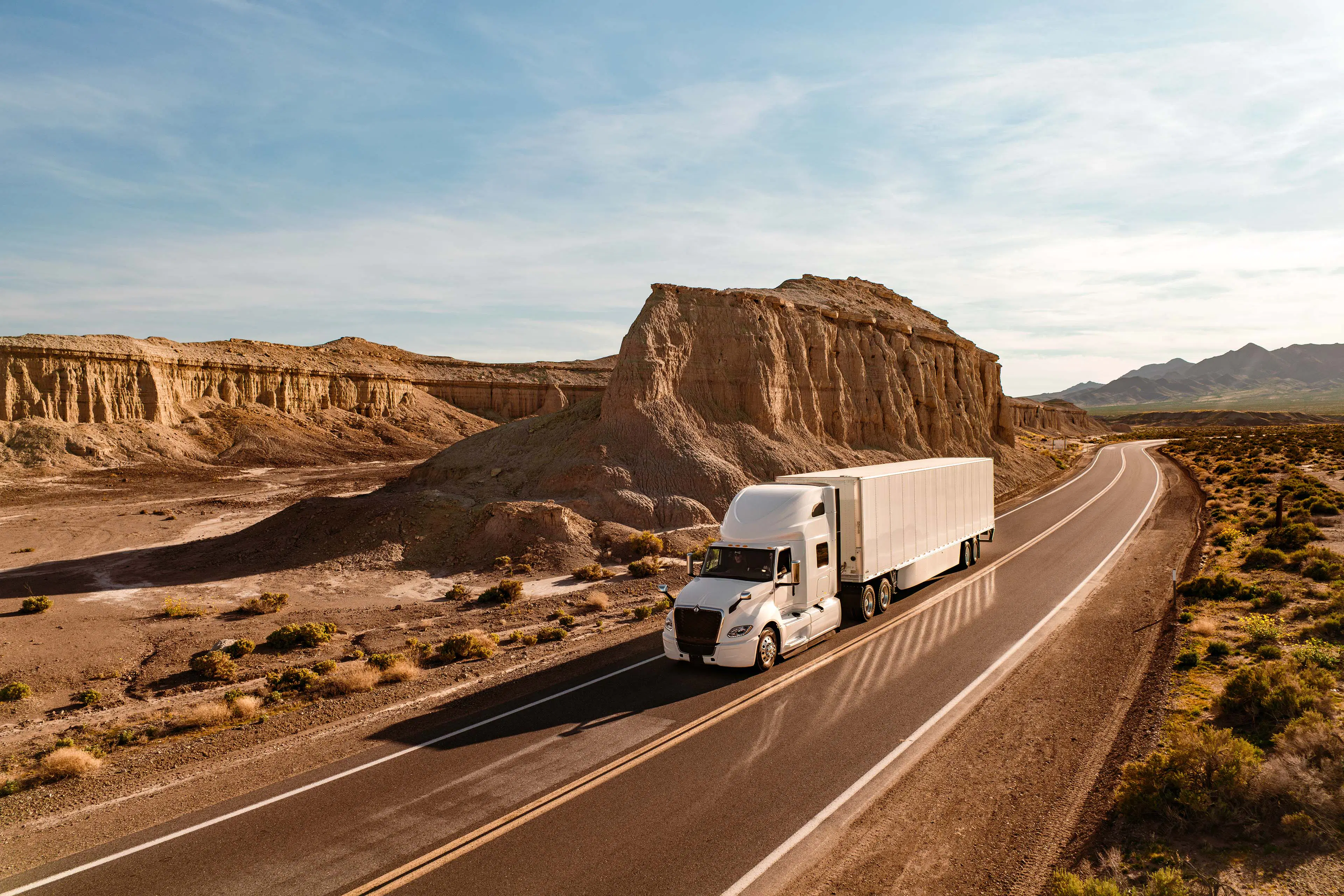 international-LT-midground-front-concrete-road-mountains-240321-0081