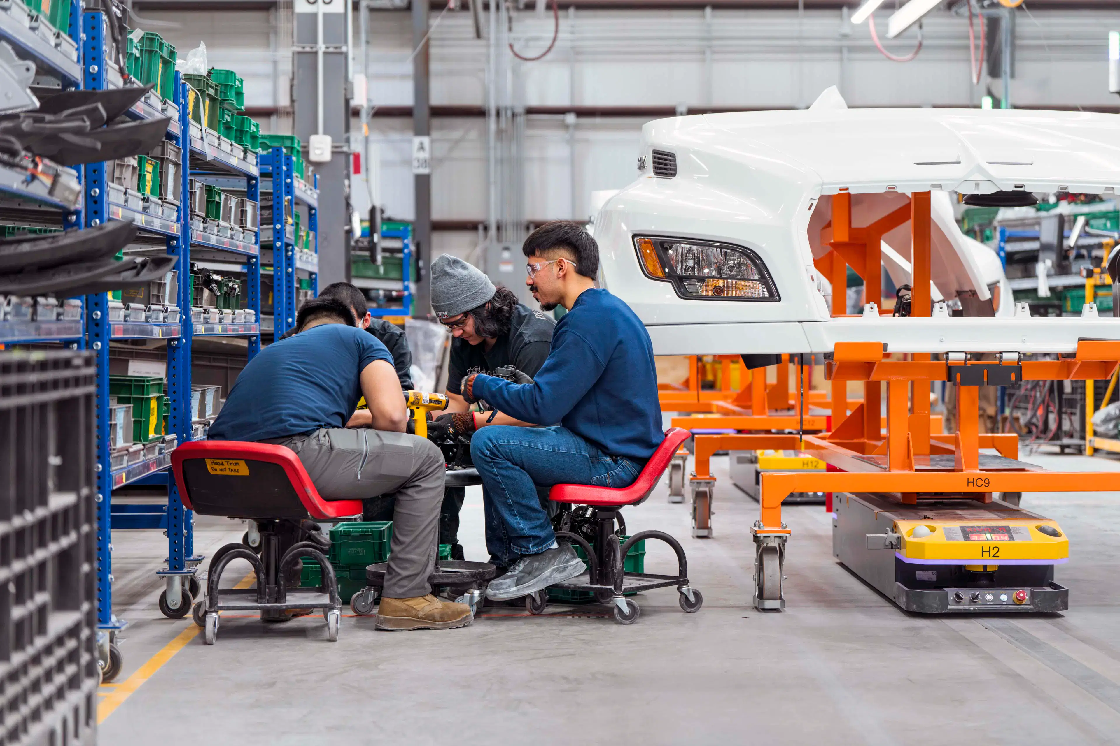 A group of men working on a machine