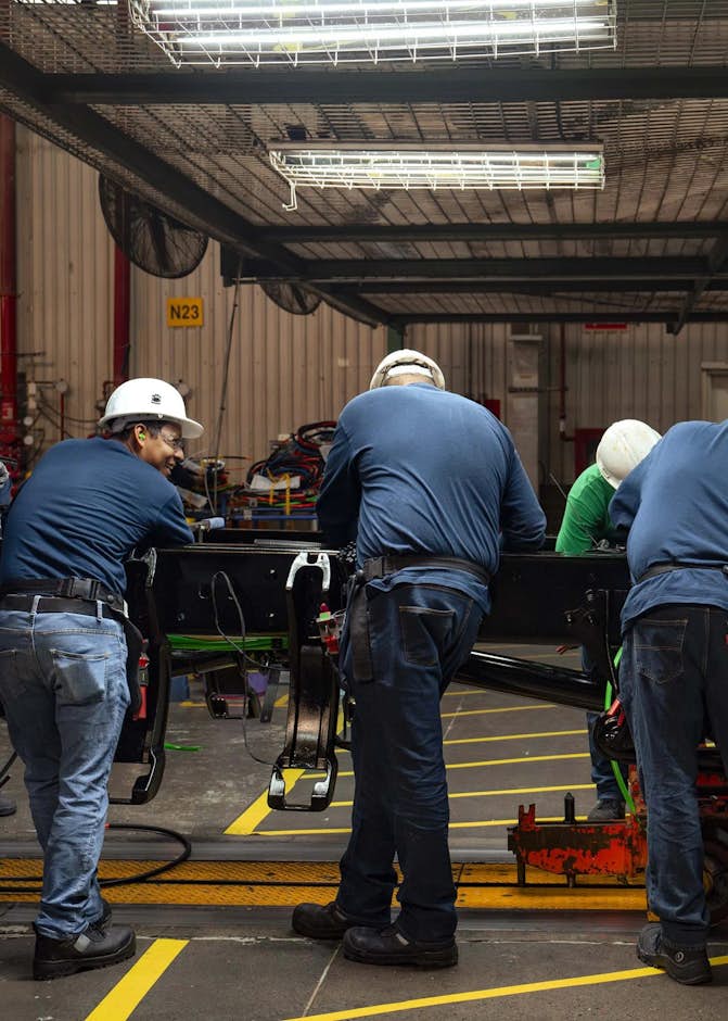 A group of men working in a factory
