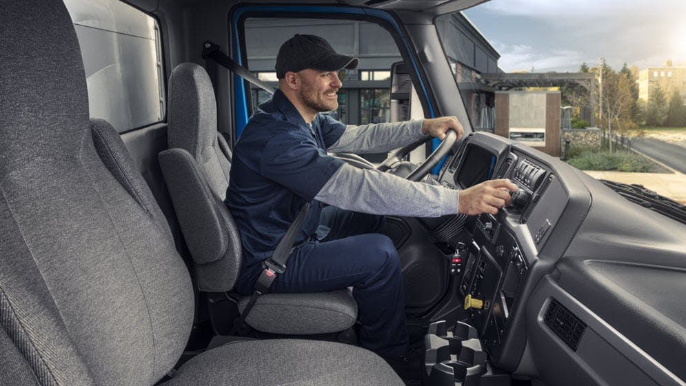 A person driving a truck