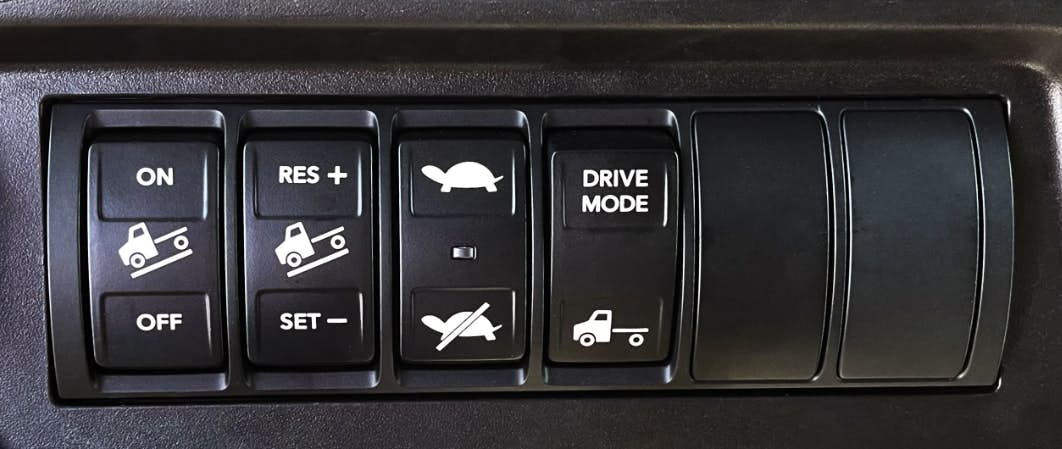 A close up of a car control panel