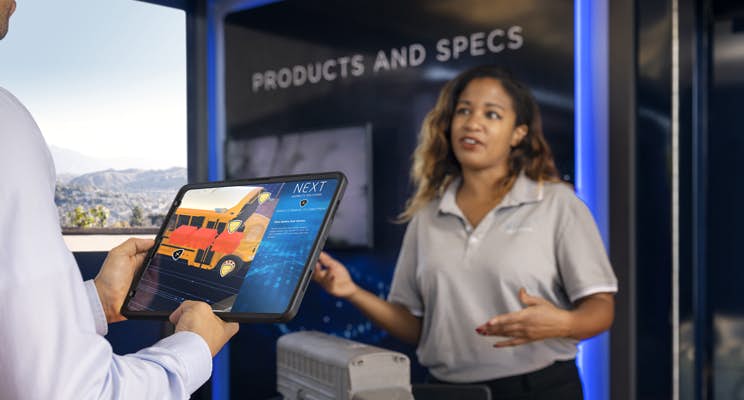 A person holding a tablet