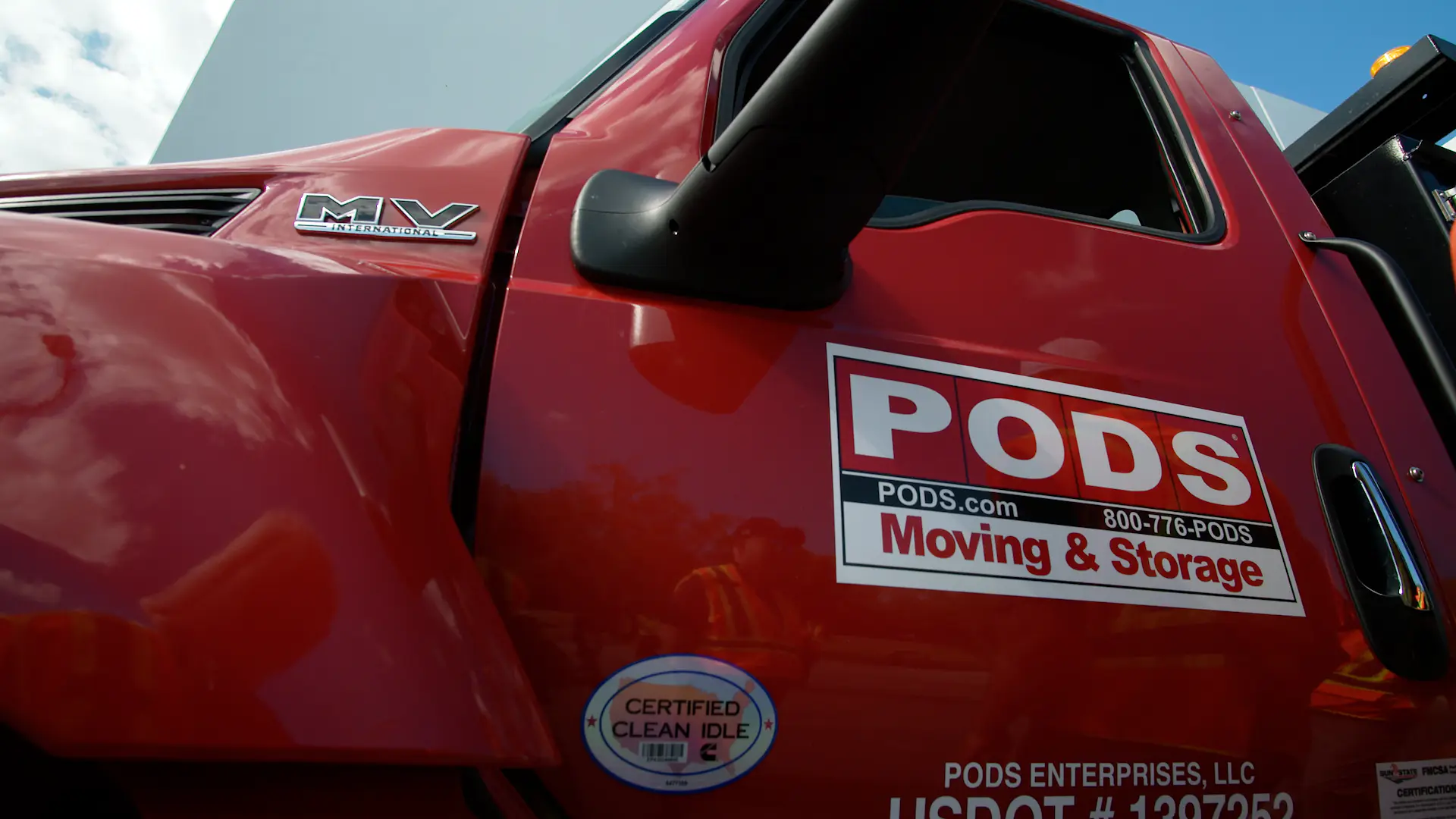 Red MV Series with PODS Moving & Storage logo side view