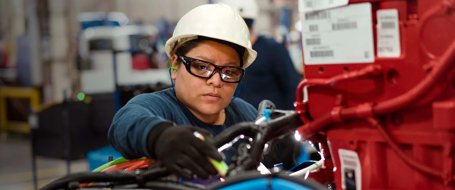 An employee working at a factory