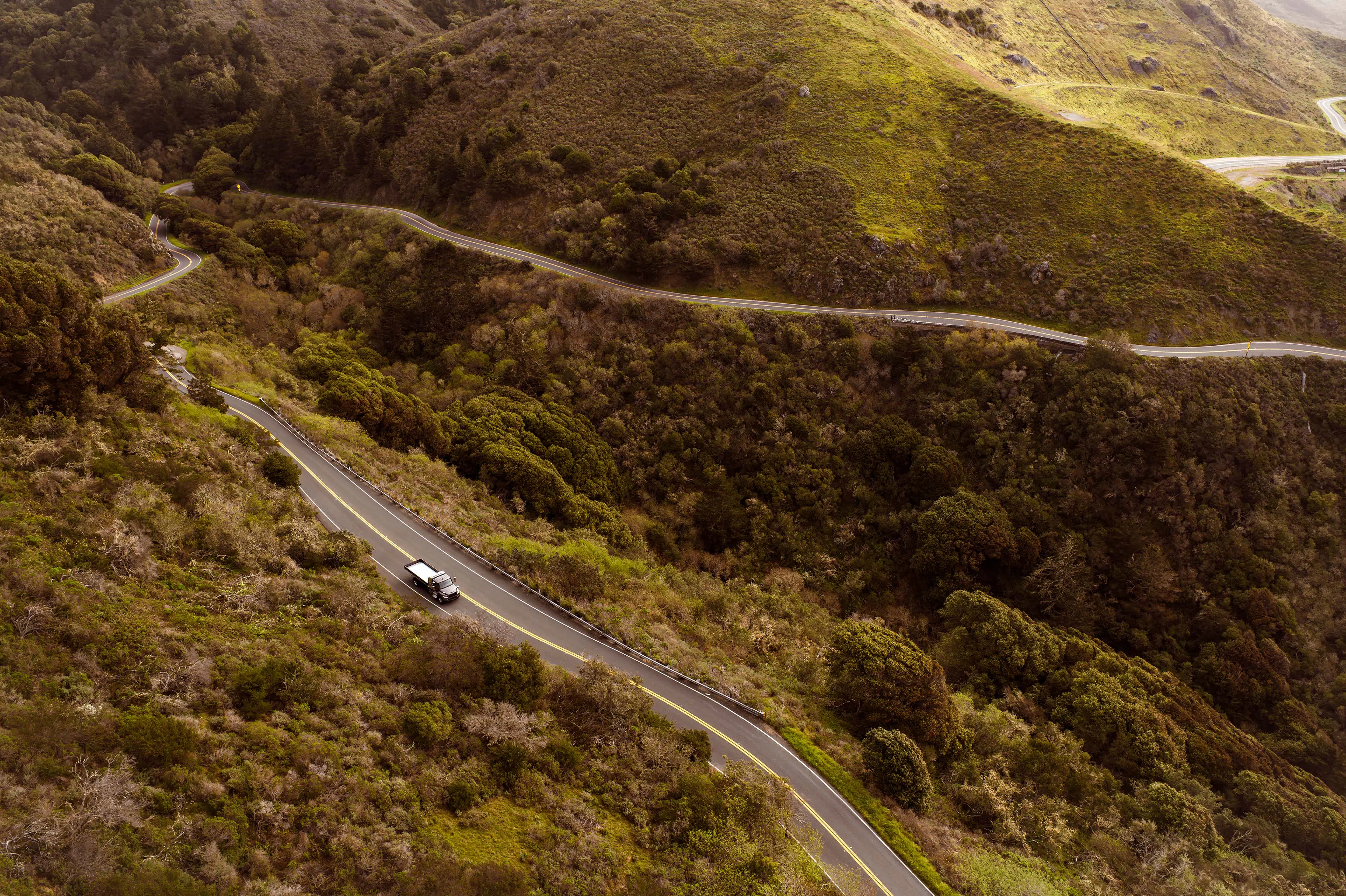 A car driving on a winding road