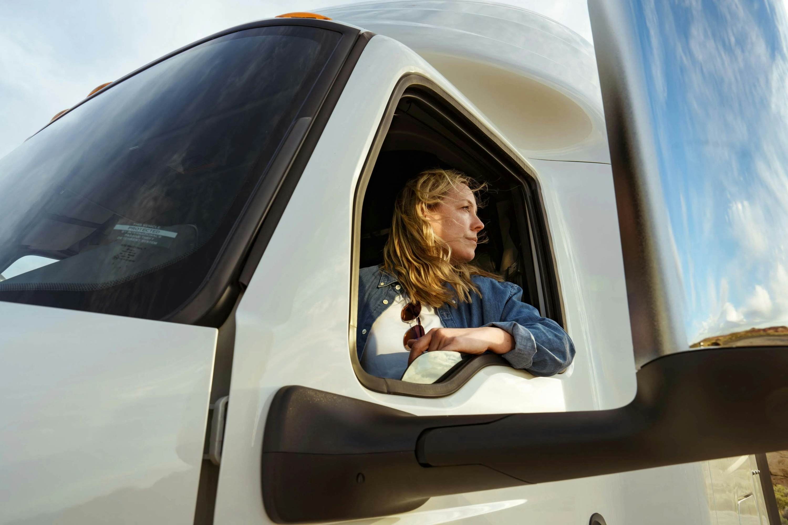 international-female-driver-portrait-driving